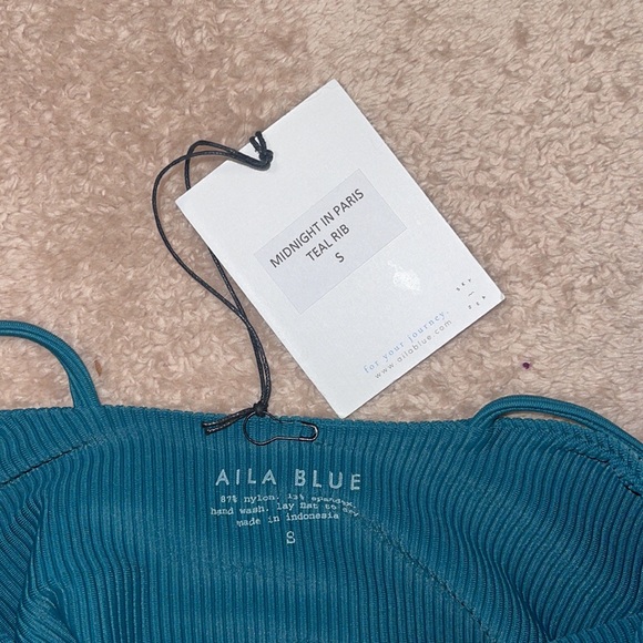 Aila one piece swimsuit size small. Its new but tried on. - Picture 6 of 7